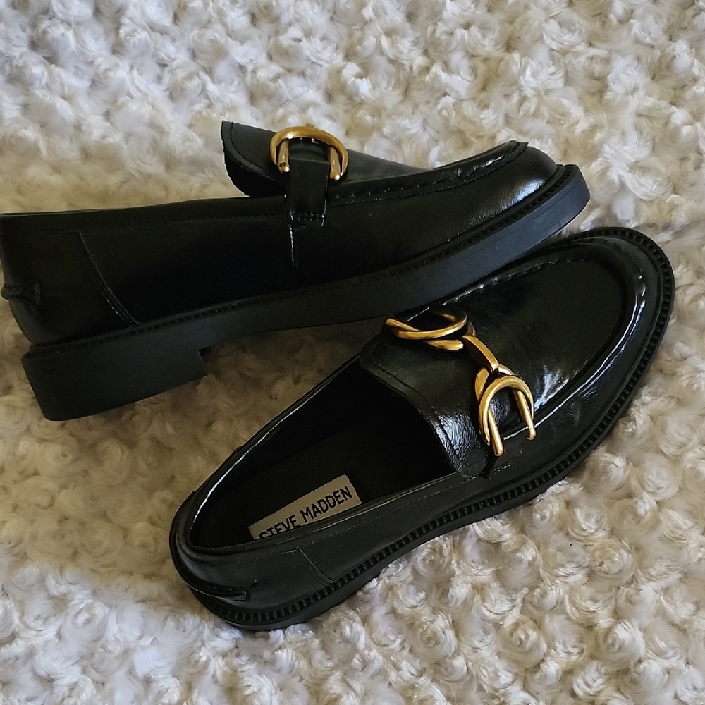 Steve Madden Glossy Black Loafers with Gold Buckles